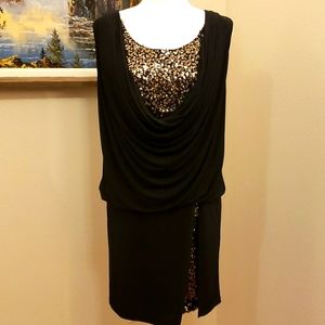 Sequin dress size 6 drop waist. Black with gold triangular sequins